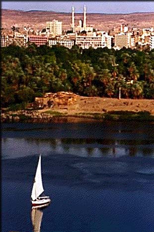 The beautiful city of Aswan and the Nile flowing by in front of it. Every year, hundreds of people visit Egypt and take tours down the Nile on luxury boats, much like the Pharaohs did thousands of years ago. Photo by www.touregypt.net.