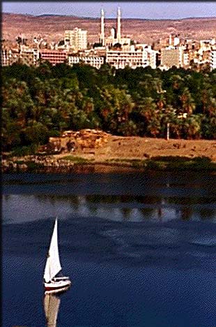 The beautiful city of Aswan and the Nile flowing by in front of it. Every year, hundreds of people visit Egypt and take tours down the Nile on luxury boats, much like the Pharaohs did thousands of years ago. Photo by www.touregypt.net.